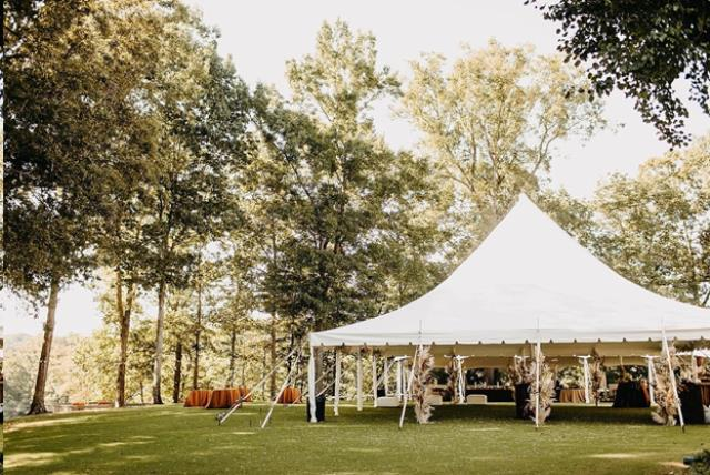 Outdoor wedding tent in the woods