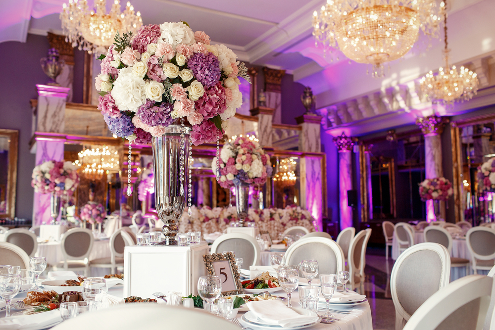 Pink and violet decorated wedding tables