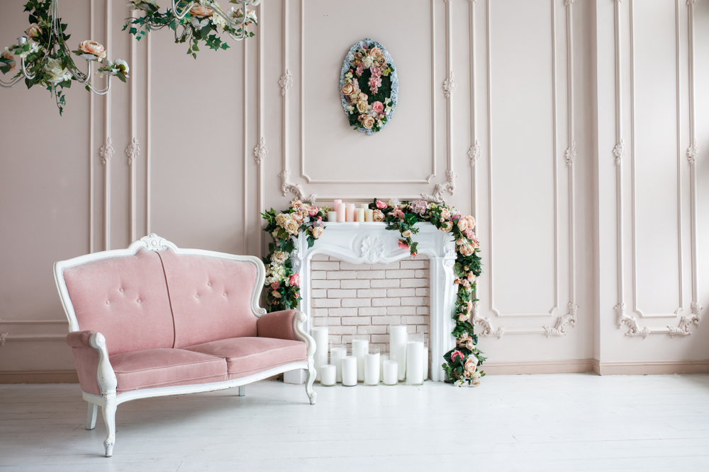 Pink and white mantel at a wedding reception