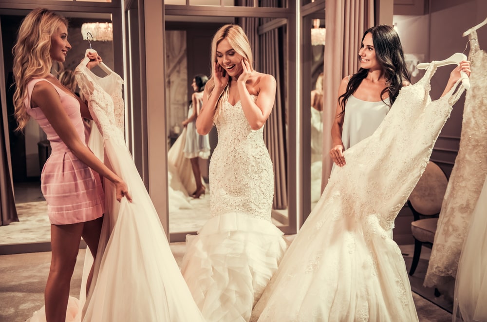 Bride and maid of honor wedding dress shopping