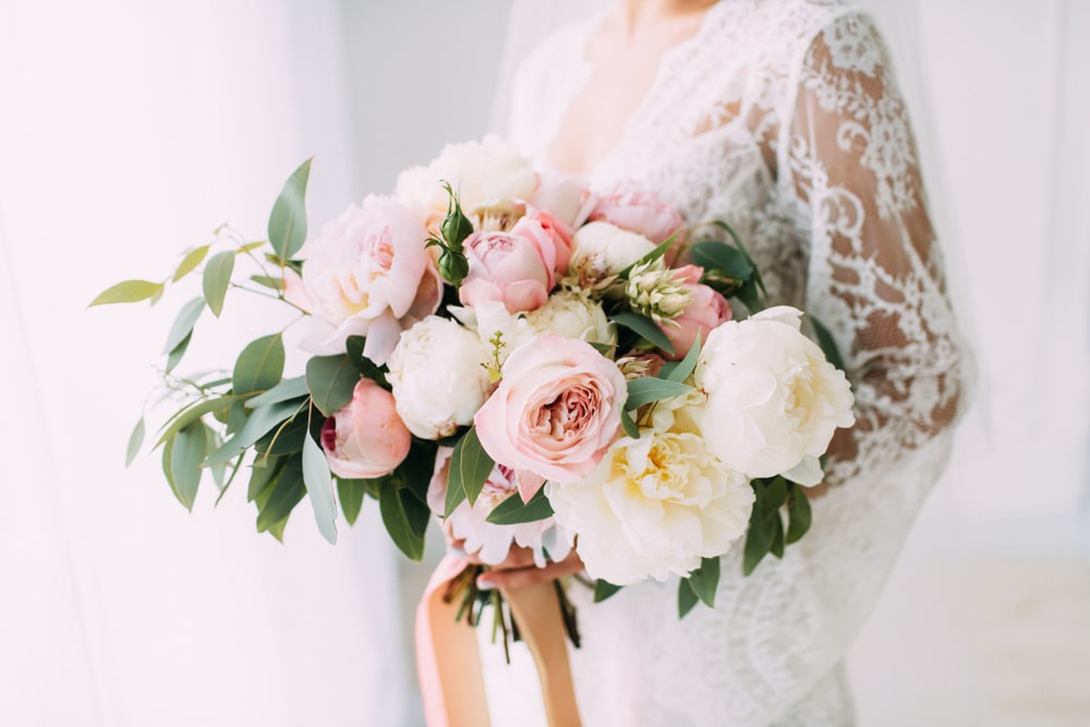 Wedding bouquet of peonies and roses