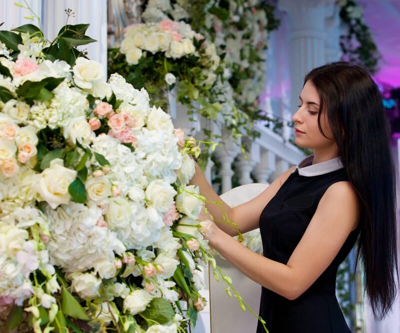 Wedding florist setting up