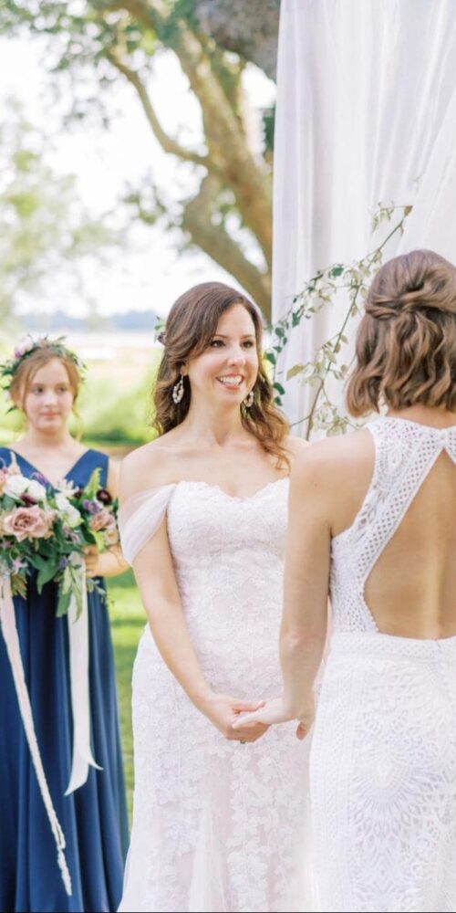 Beautiful Brides During an Outdoors Summer Wedding Ceremony