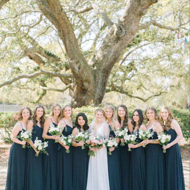 Beautiful bride and bridesmaids posing on the wedding day