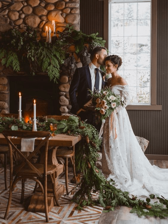 Bride and groom among winter inspired reception decor