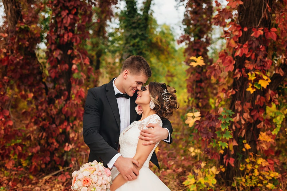 Wedding couple in autumn nature