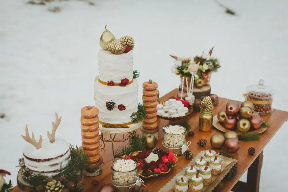 Wedding winter candy table and cake in the snow Wedding winter candy table and cake in the snow