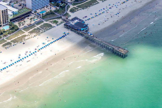 Aerial views of Myrtle Beach packed with summer tourists
