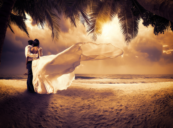 wedding couple with the sunset on the beach