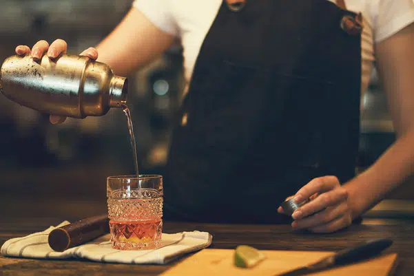 Mixologist mixing a cocktail