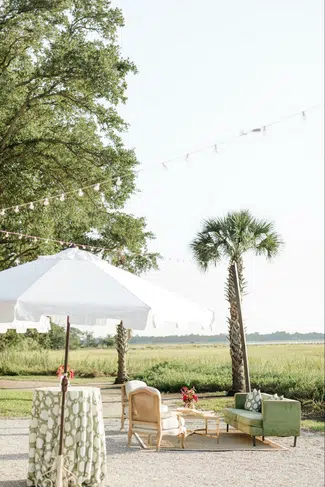 Outdoor seating arrangement in the sun with an umbrella as shade