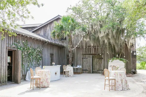 Wedding decor with lights, tables and chairs