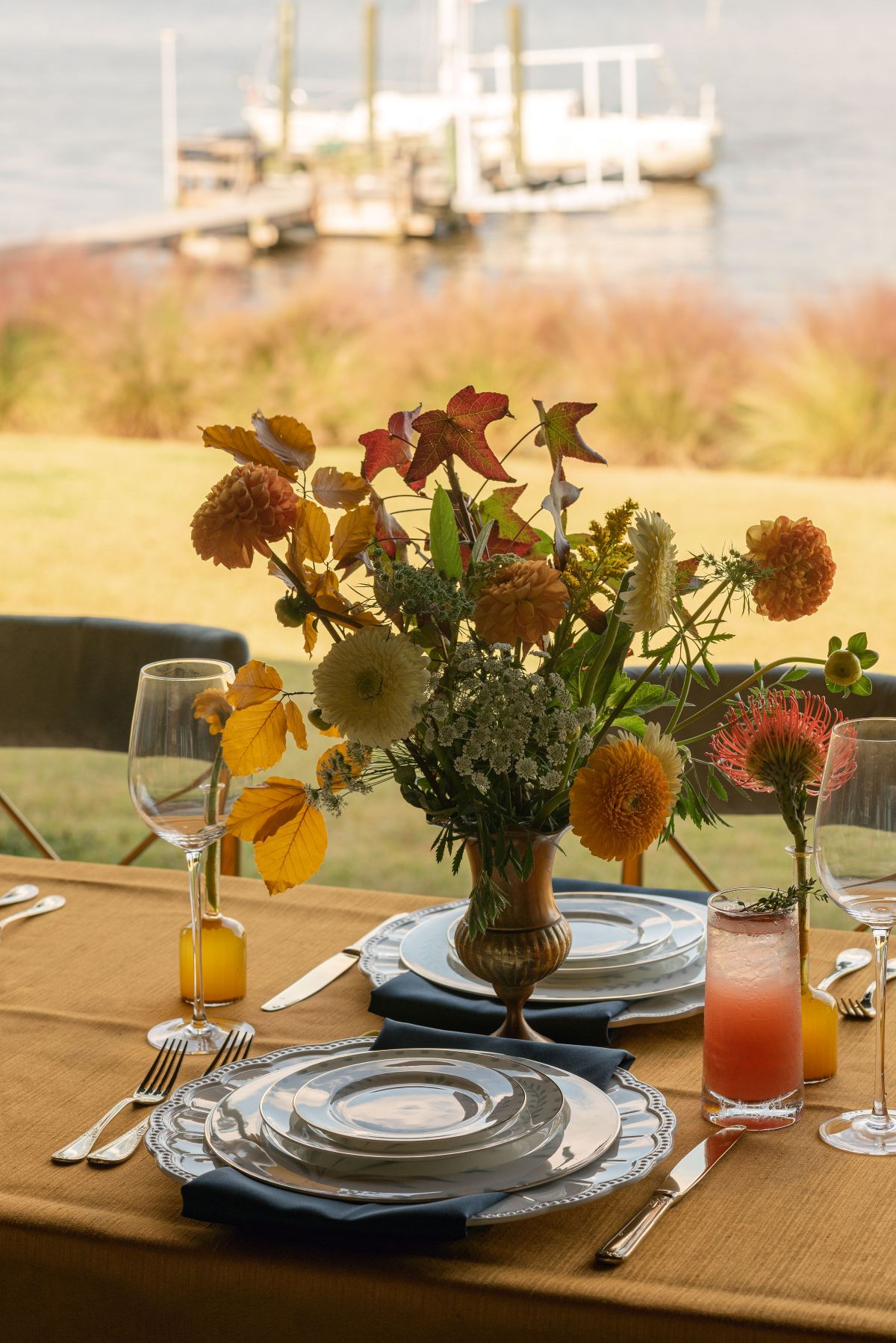 Floral centerpiece on a catered dining table