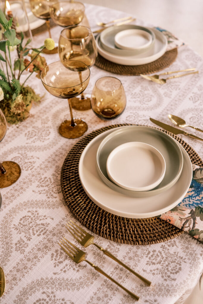 boho wedding table setting woven charger amber glassware