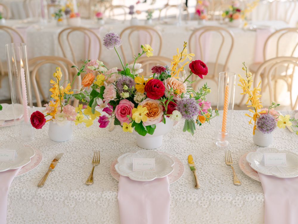 Colorful floral tablescape with textured white linen
