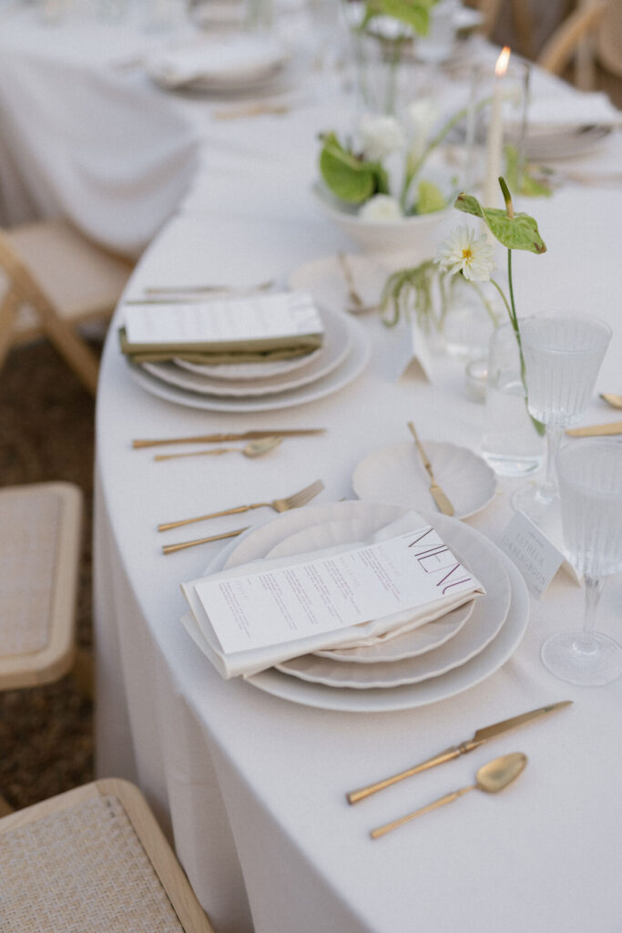 outdoor wedding reception with bistro lights and garden venue