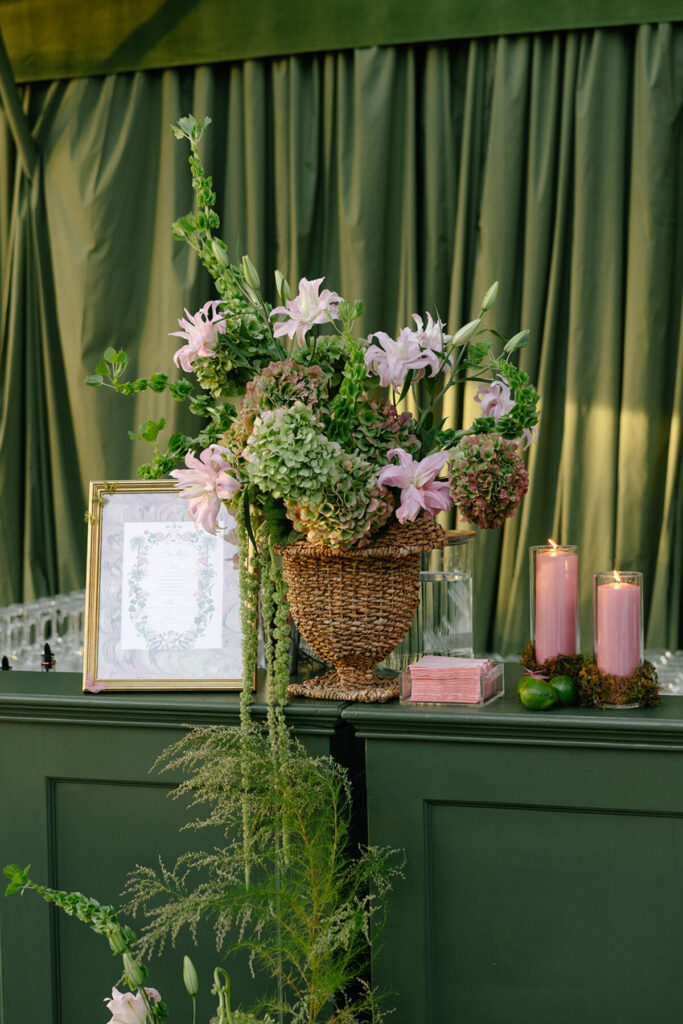 wedding bar decor green floral arrangement candles