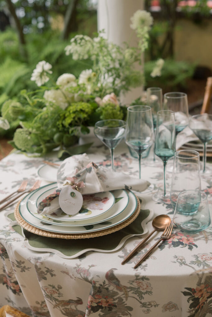 wedding table centerpiece with white flowers and greeneryjpg