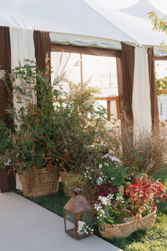wedding tent entrance decor floral installation
