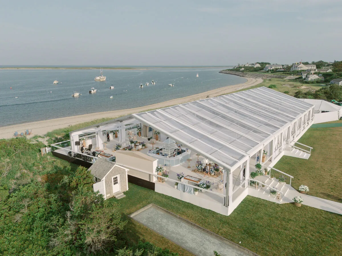 Clear-top waterfront wedding tent overlooking the coast