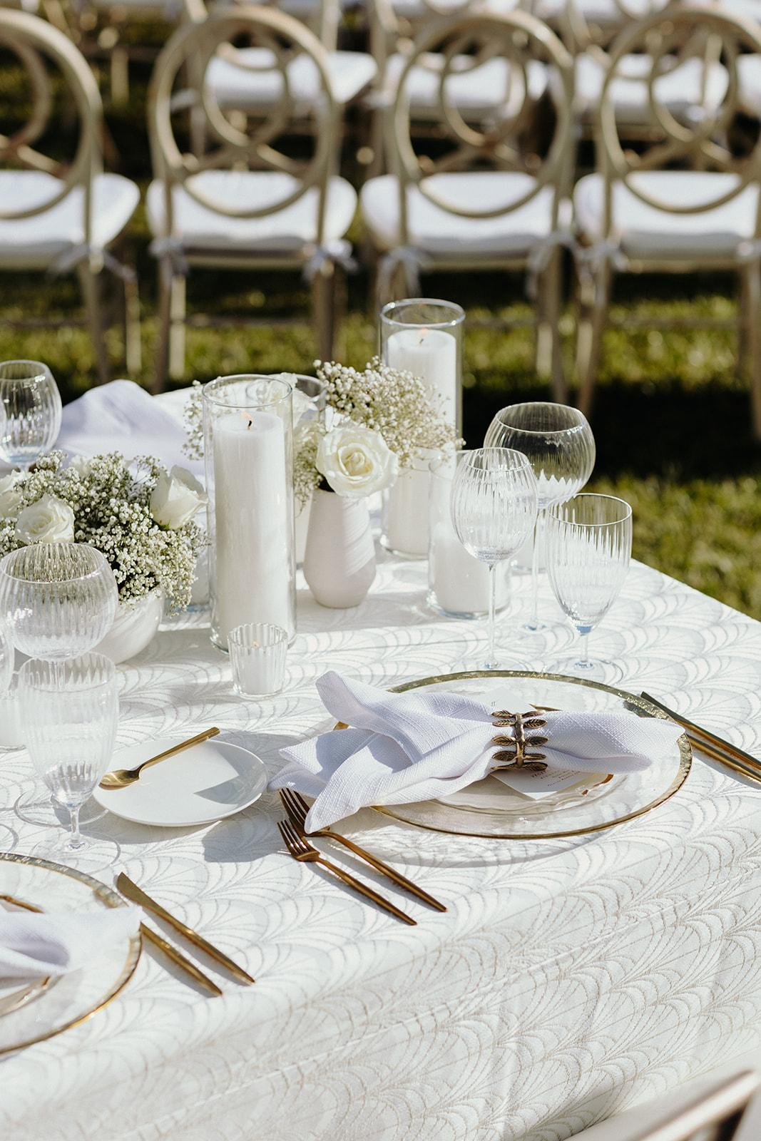 dac8913c 751f 4934 9e6e 227e2245dc71jpeg | Curated Events Event planner reviewing china and glassware rentals in a professional workspace, highlighting meticulous planning