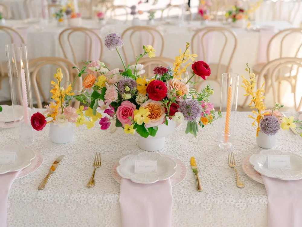 | Curated Events Coordinated napkins and linens on a holiday dining table